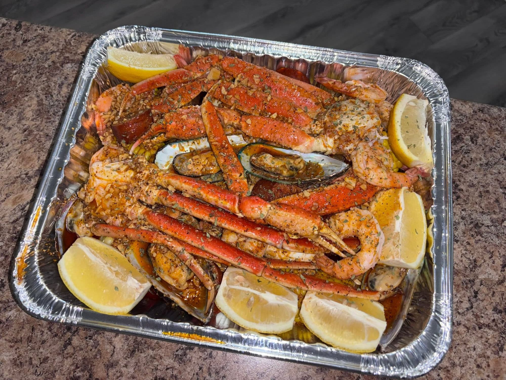 Loaded seafood boil platter with crab legs